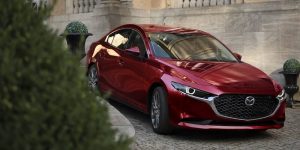 A red 2025 Mazda3.